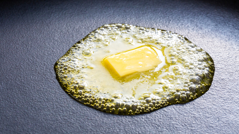 Butter melting in a hot pan