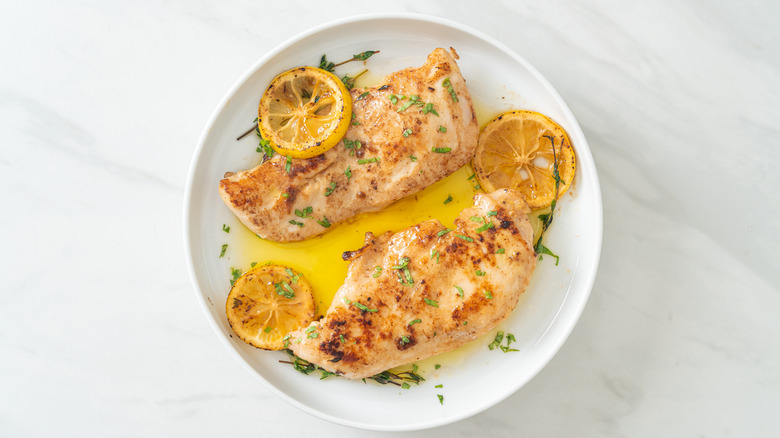 Grilled chicken with butter and lemon