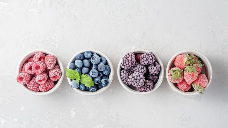Frozen berries in small bowls