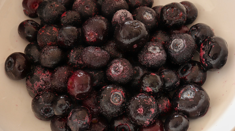 Bowl of thawing frozen blueberries