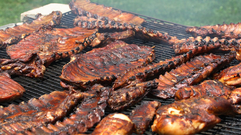 racks of rib meat grilling