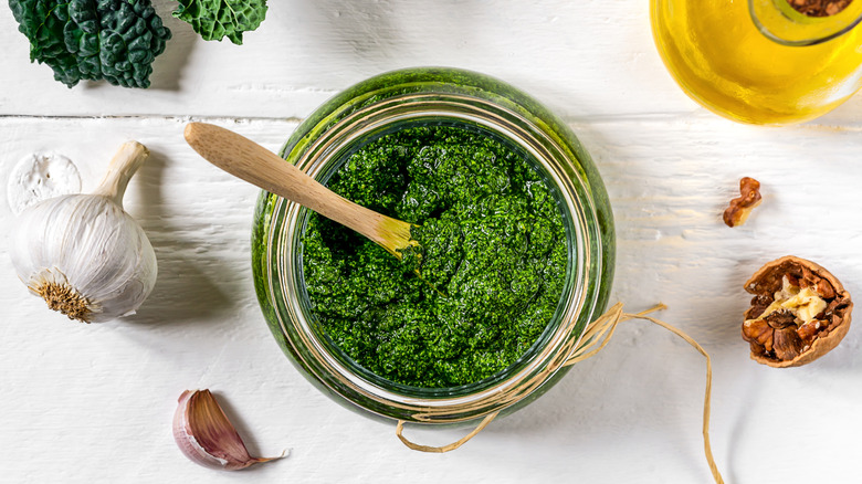 kale pesto surrounded by its ingredients