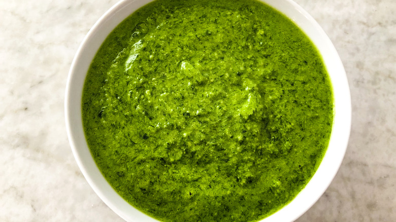 basil pesto in white bowl