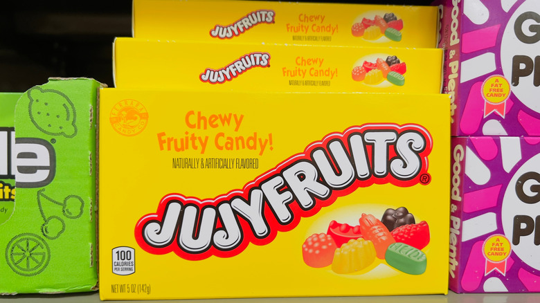 Yellow boxes of Jujyfruits on a store shelf