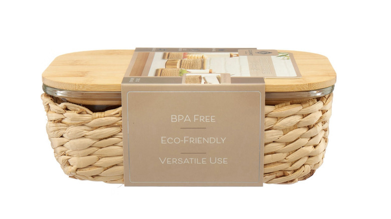 Seagrass glass storage bin on white background