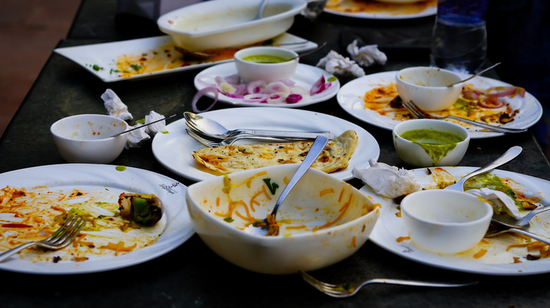 Restaurant table with dirty dishes