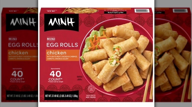 Egg rolls in red box on white background