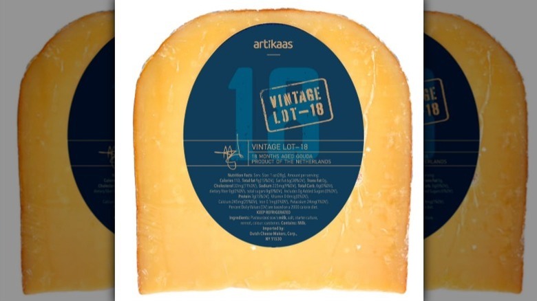 Vintage lot gouda with a dark blue label on white background
