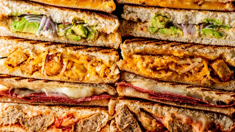 piles of various sandwiches