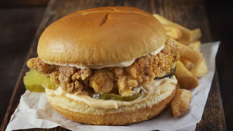 fried chicken burger with fries