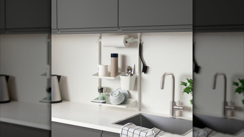Sunnersta organizer set in kitchen by a sink and white counters