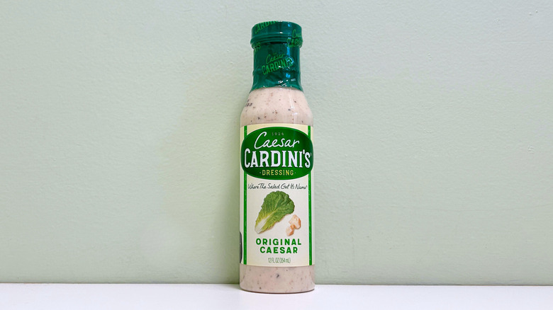 A bottle of Cardini's Original Caesar Salad Dressing