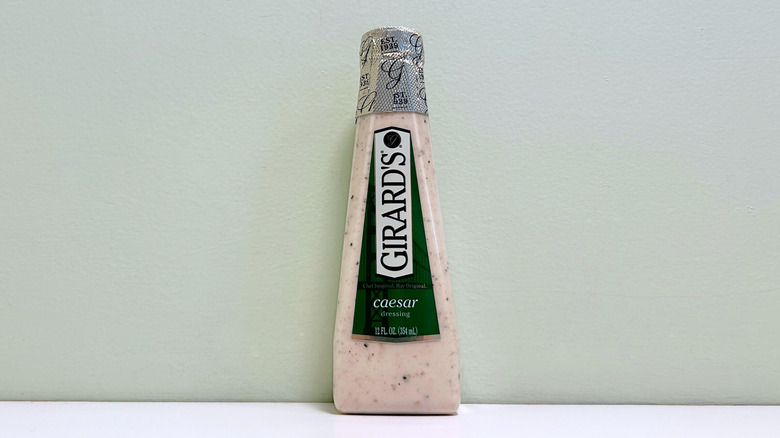 A bottle of Girard's Caesar Salad Dressing