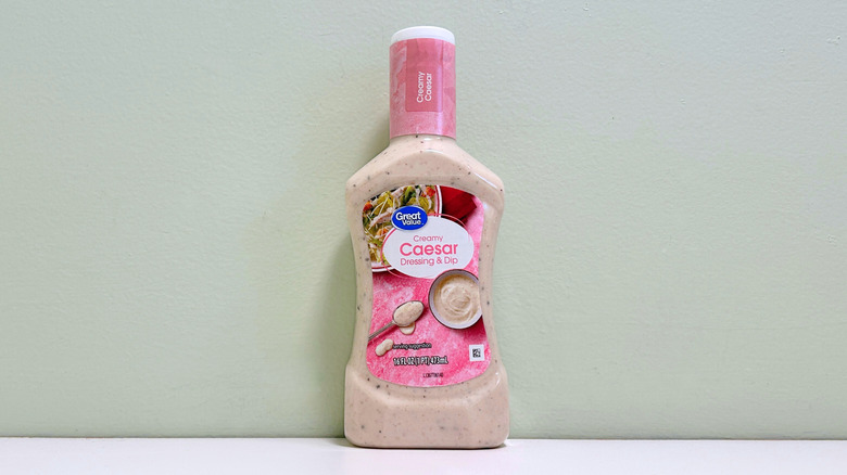 A bottle of Great Value Creamy Caesar Salad Dressing