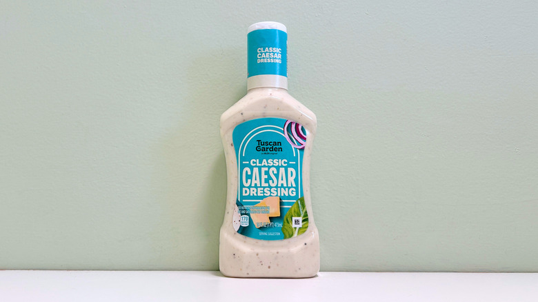 A bottle of Tuscan Garden Classic Caesar Salad Dressing