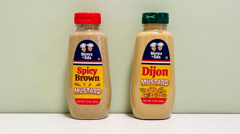 Bottles of Steve and Ed's Spicy Brown Mustard and Steve and Ed's Dijon Mustard