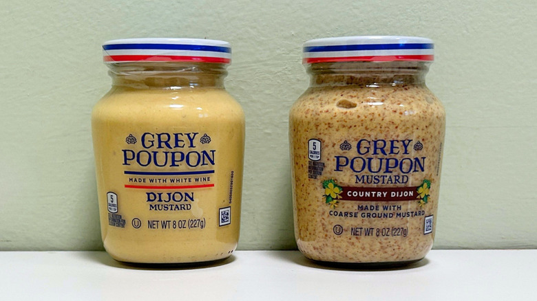 Jars of Grey Poupon Dijon Mustard and Grey Poupon Country Dijon Mustard