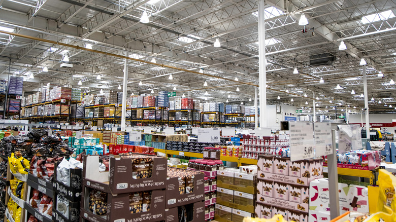 Costco store interior, with multiple products displayed in creates