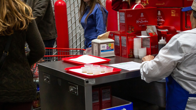 View of a sample cart at Costco, with Club Demonstration Services representative