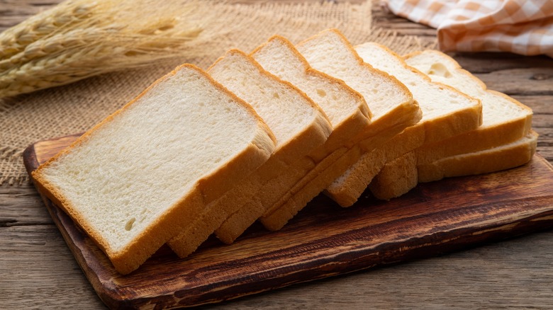 white bread slices on board