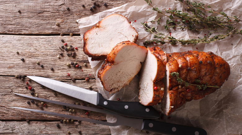 Roasted turkey slices on board