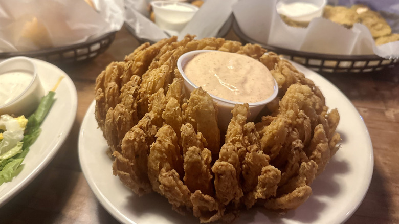 Fried onion dish cactus blossom on a texas roadhouse table