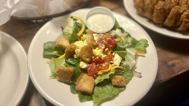 A side portion of the house salad with ranch at texas roadhouse