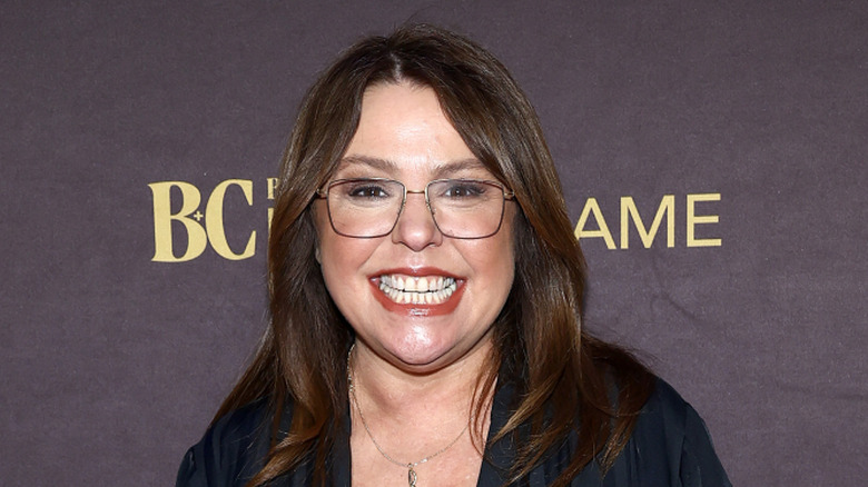 Promotional photograph of Rachael Ray grinning