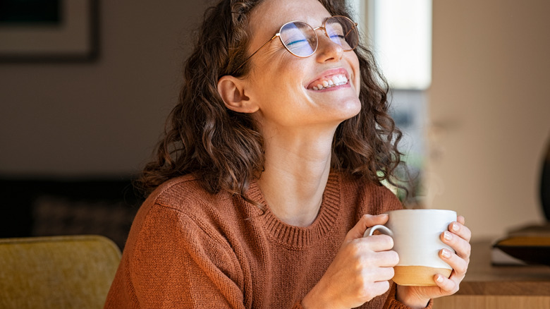 Woman Holding Coffee