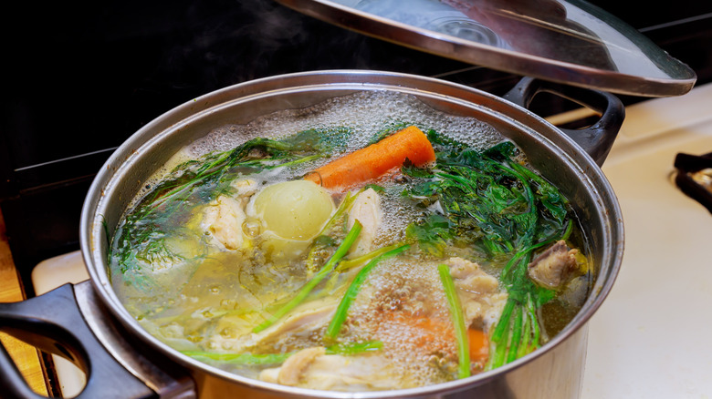 chicken broth cooking in pot