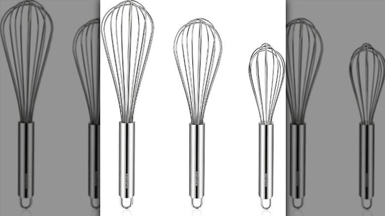 Three piece whisk set on white background