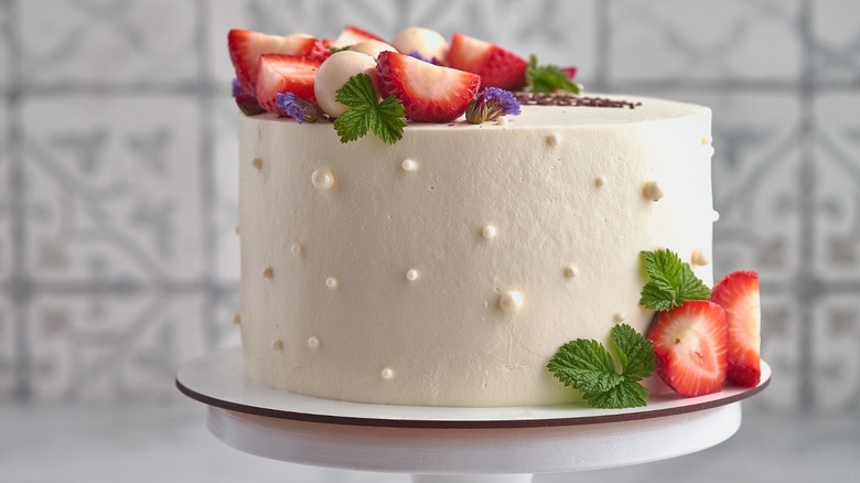 White frosted cake with strawberries