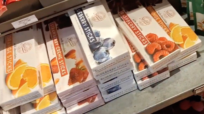 Boxes of Sweets Chocolate Sticks in blueberry, raspberry, strawberry and orange