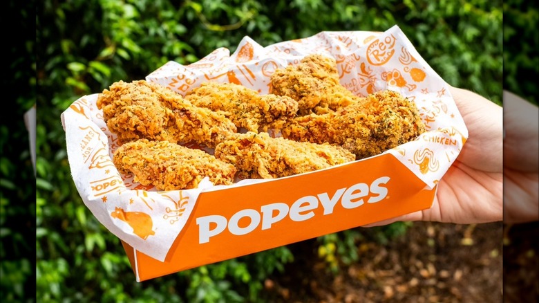 Popeyes Louisiana Kitchen to-go box full of traditional wings