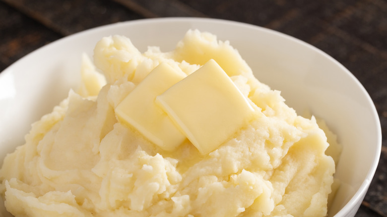 bowl of mashed potatoes on table