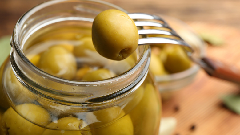 jar of olives with brine