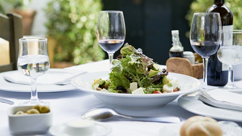 salad and wine on table