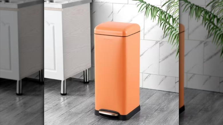 Happimess retro trash can sits by counter