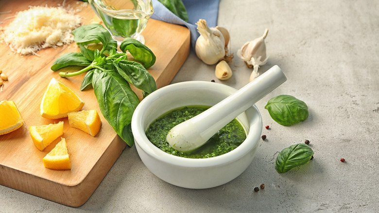 pesto with lemons on side