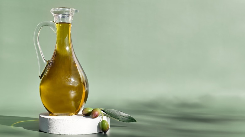 olive oil in glass pitcher