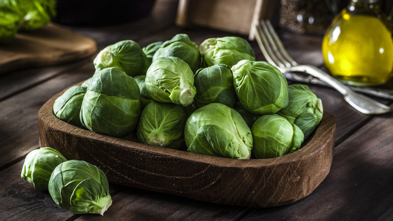 brussels sprouts in wooden bowl