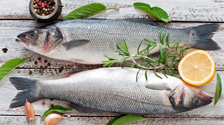 two whole fish with lemon