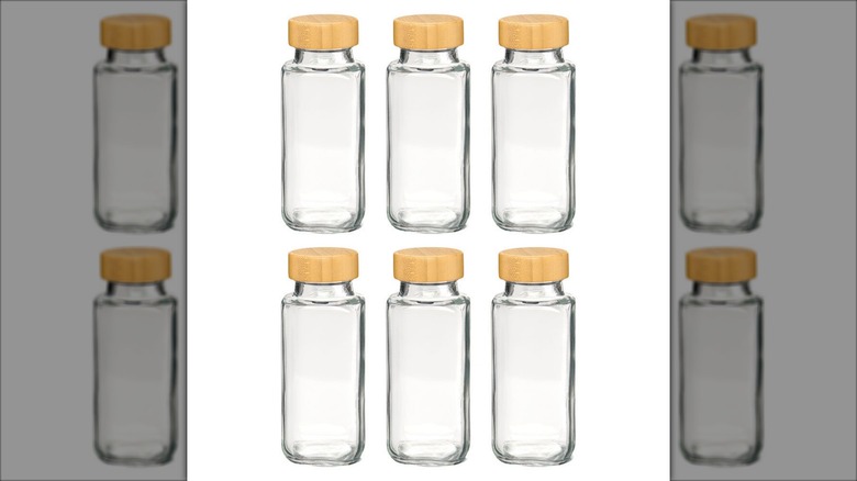 Product image of the Crofton 6-pack glass juice bottles with bamboo lids against a white background.