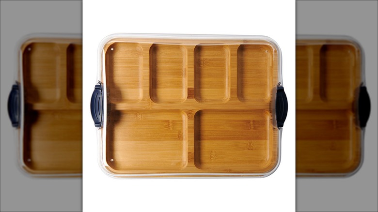 Product image of the bamboo Crofton charcuterie to-go board with two large sections and four smaller ones against a white background.