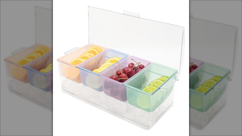 Product image of the Crofton condiment caddy with light orange, blue, pink, and green translucent sections against a white background.