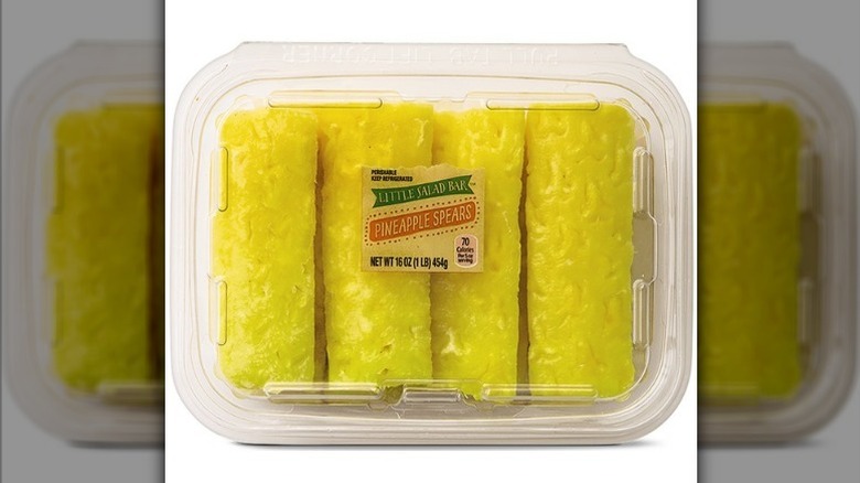 Pineapple spears on white background