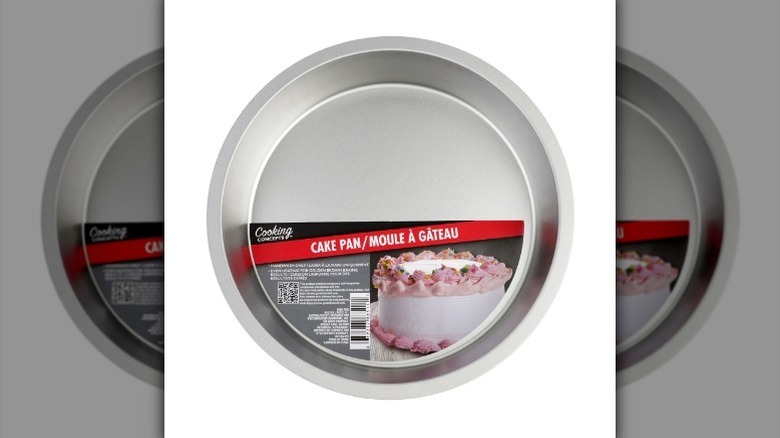 Round cake pan on white background