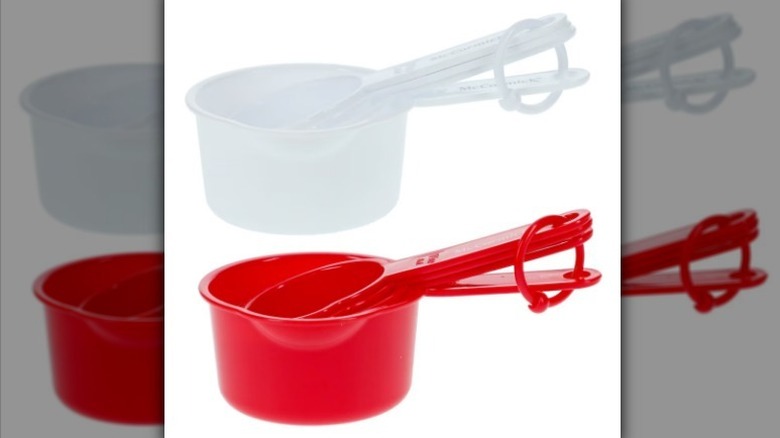 Red and white measuring cup set with white background