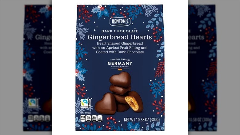 Dark chocolate gingerbread hearts on white background