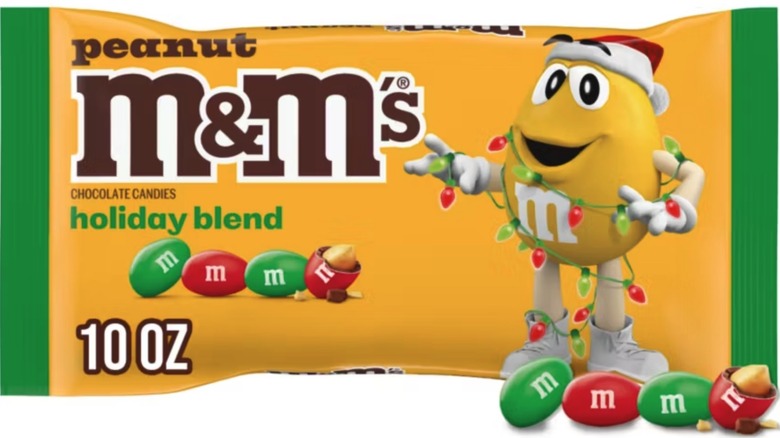 Holiday peanut M&Ms bag on white background